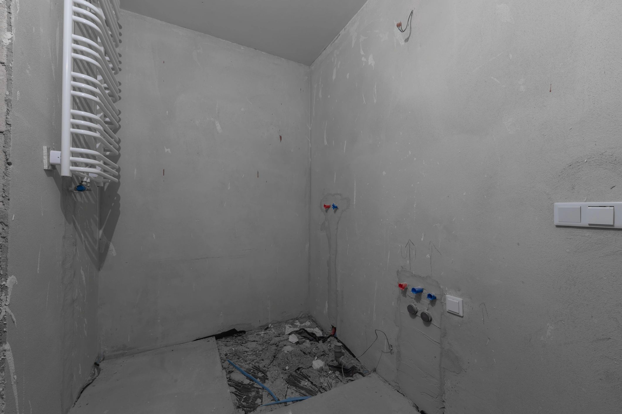 Bathroom under construction with drywall